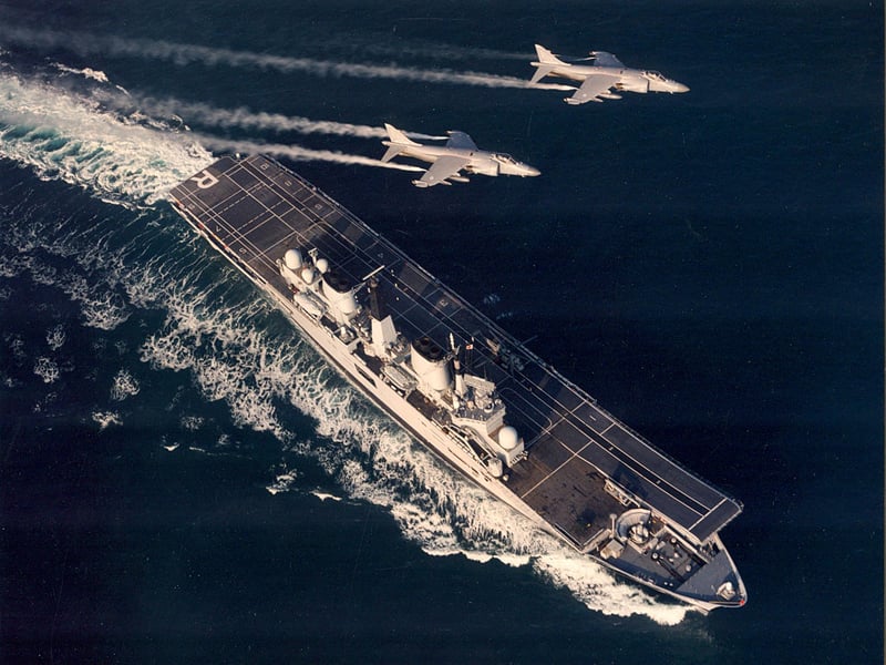 Two Royal Navy Sea Harrier FRS2 overflying HMS Ark Royal during the latest sea trials of Britain's most capable and formidable multi-role fighter aircraft. Picture: Phil Boyden