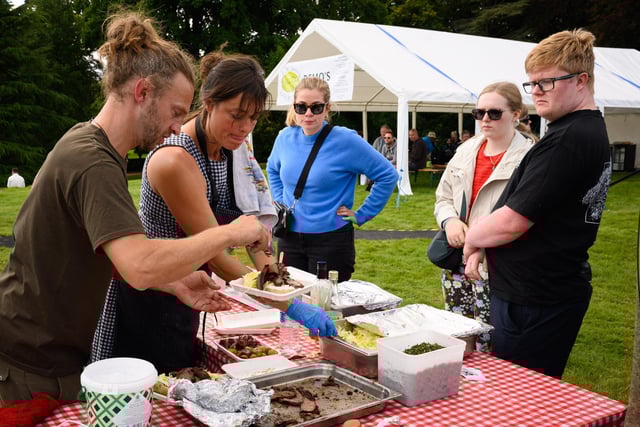 Pictured is: Serving hungry customers Picture: Keith Woodland (140921-85)