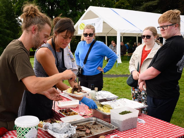 Pictured is: Serving hungry customers Picture: Keith Woodland (140921-85)