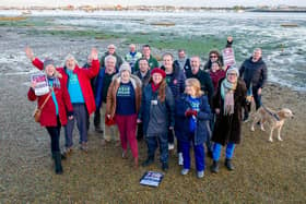 Stop Aquind protestors with Steve Pitt, council leader Gerald Vernon-Jackson, Cllr Lee Hunt, cllr Simon Bosher, and cllr Rob New as they celebrate near Lock Lake, Portsmouth. Picture: Habibur Rahman