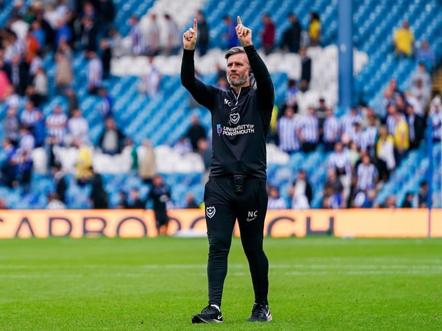 Nicky Cowley goes over to thank the travelling faithful.