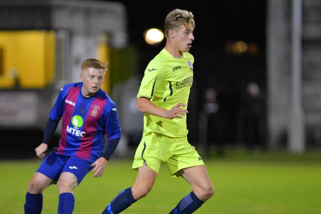 Horndean's Alfie Lis was forced off in the weekend draw with AFC Portchester. Picture: Martyn White
