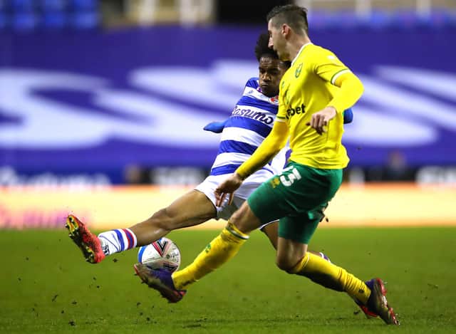 Jayden Onen tackles Norwich's Kenny McLean in Reading colours. (Photo by Warren Little/Getty Images)