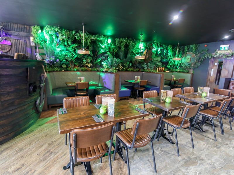 The captains table overlooks the restaurant and gives a great view of all the pirate themed features.