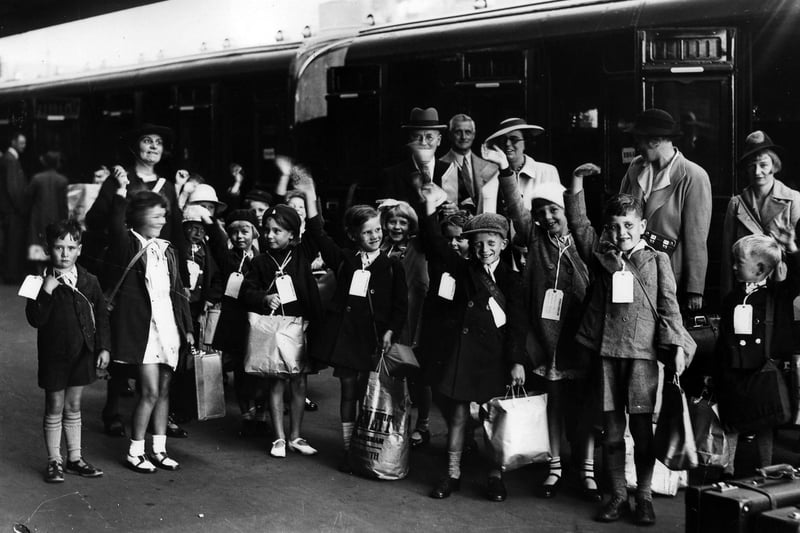 Children wave goodbye to Portsmouth September 1939. The News PP308