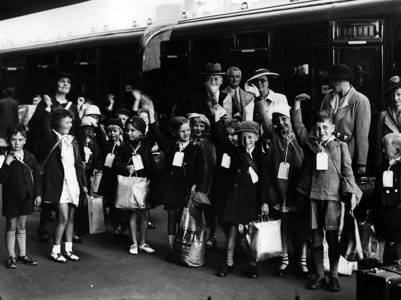 Children wave goodbye to Portsmouth September 1939. The News PP308