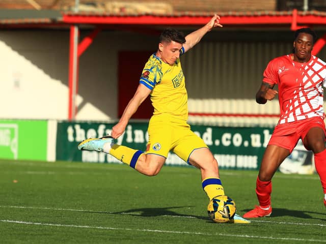 Hawks' James Roberts pulls the trigger in his side's FA Cup win at Carshalton. Picture by Dave Haines