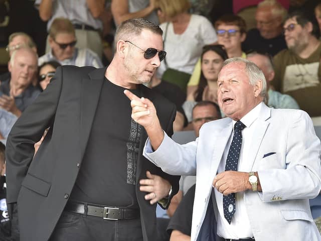 Peterborough chairman Darragh MacAnthony and director of football Barry Fry