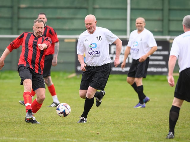Action from the Jon Gittens memorial charity match between a team of former Fareham Town players and a side of ex-Pompey and Southampton professionals. Picture: Keith Woodland (160421-154)