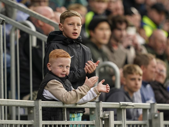 Pompey fans played a big role in carrying their team to a massive three points in their Championship survival battle against Blackburn Rovers.