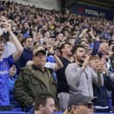 Pompey fans played a big role in carrying their team to a massive three points in their Championship survival battle against Blackburn Rovers.