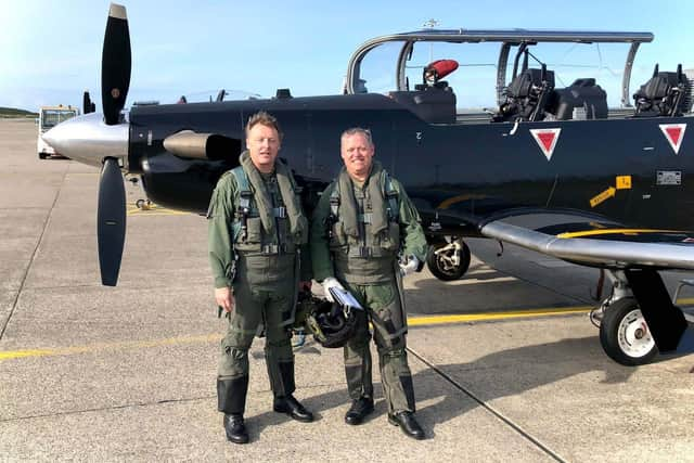 L to R: Tim and Paul after flying the Texan. Picture: Royal Navy..