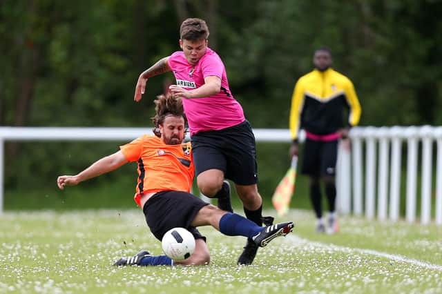 AFC Trades (pink) have been moved up three divisions after winning the City of Portsmouth Sunday League Division 5 title. Picture: Chris Moorhouse