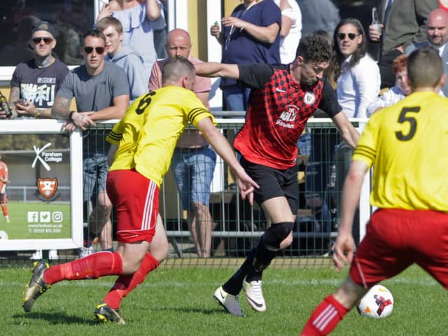 Locks Heath (red/black) in action during the 2016/17 Hampshire Intermediate Cup final against Whitecroft and Barton Sports. There have been few bright moments since for the one-time Hampshire Premier League champions.
Picture Ian Hargreaves