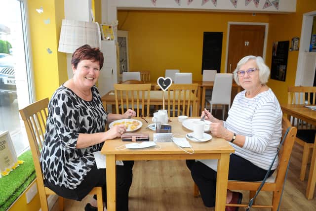 Kathy's Cafe in Gosport Road, Stubbington.
Pictured is: Sharon Brown with her mum Margaret Hall enjoying some lunch at Kathy's Cafe.
Picture: Sarah Standing (091020-5252)