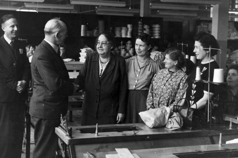 Some of the women workers at the Twilfit factory, which was located at Farlington, sent in by John Porter. John's aunt Jane is the lady third from the right. He believes it was a retirement occasion for the lady with the spectacles.
