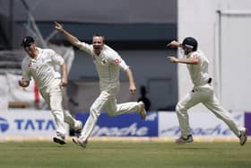 Shaun Udal celebrates with Andrew Flintoff and Ian Bell after taking the key wicket of Sachin Tendulkar  at the Wankhede Stadium, Mumbai, in March 2006. Photo by Ben Radford/Getty Images.