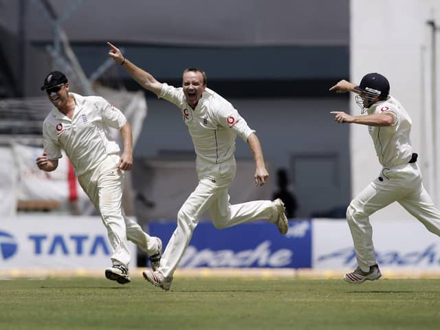 Shaun Udal celebrates with Andrew Flintoff and Ian Bell after taking the key wicket of Sachin Tendulkar  at the Wankhede Stadium, Mumbai, in March 2006. Photo by Ben Radford/Getty Images.