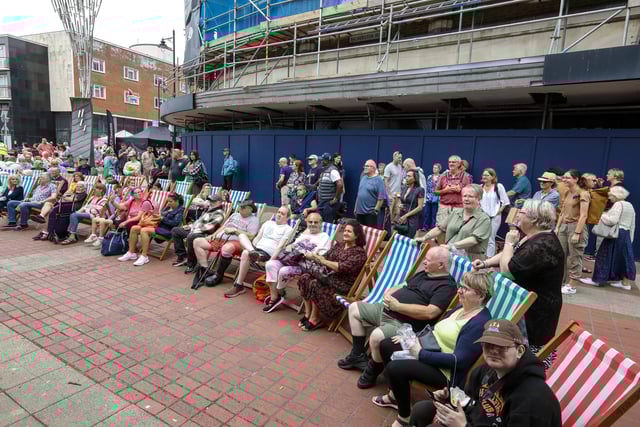 Sitting and listening to the music. Southsea Food Festival on Palmerston, Clarendon and Osborne Roads
Picture: Chris Moorhouse (200724-30)
