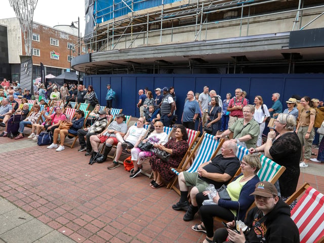 Sitting and listening to the music. Southsea Food Festival on Palmerston, Clarendon and Osborne RoadsPicture: Chris  Moorhouse (200724-30)