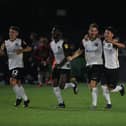 Members of Pompey's Academy celebrate after a penalty shoot-out victory at Basingstoke in the Hampshire Senior Cup. Picture: Stuart Martin (220421-7042)