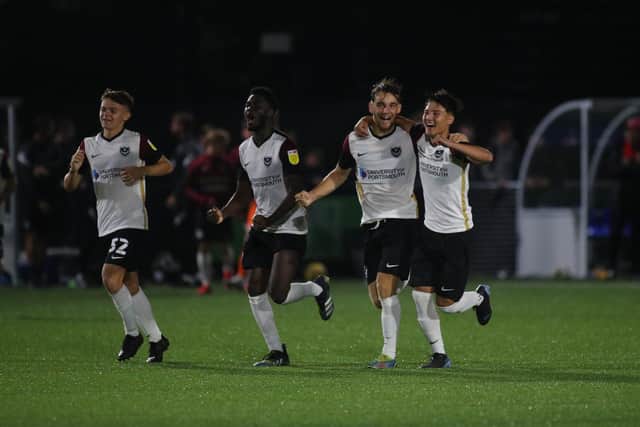 Members of Pompey's Academy celebrate after a penalty shoot-out victory at Basingstoke in the Hampshire Senior Cup. Picture: Stuart Martin (220421-7042)