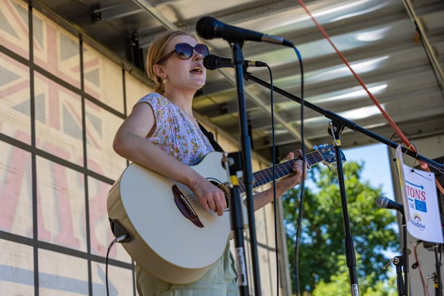 Brighton based singer Dixie Darling (22) performing at the Rainbow Centre Family Fun Day. Picture: Mike Cooter (240623)