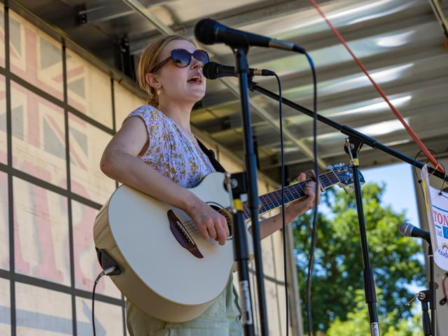 Brighton based singer Dixie Darling (22) performing at the Rainbow Centre Family Fun Day. Picture: Mike Cooter (240623)