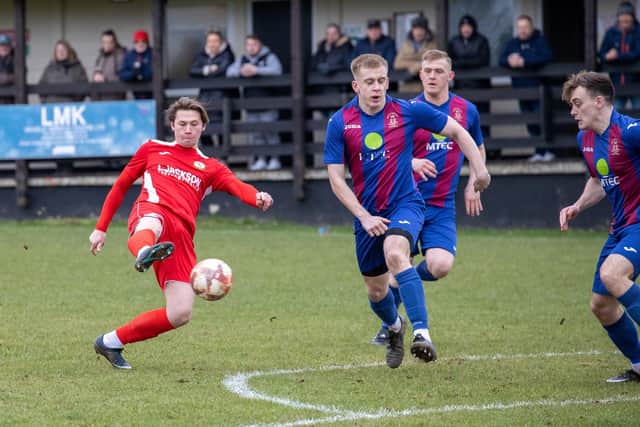 Horndean's Tommy Scutt in action against US Portsmouth. Picture by Alex Shute