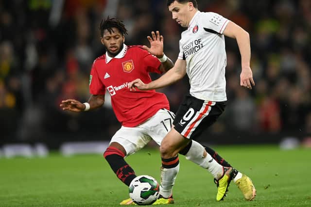 Portsmouth-born Albie Morgan gets away from Fred when Charlton faced Manchester United in the Carabao Cup last January. (Photo by Gareth Copley/Getty Images)