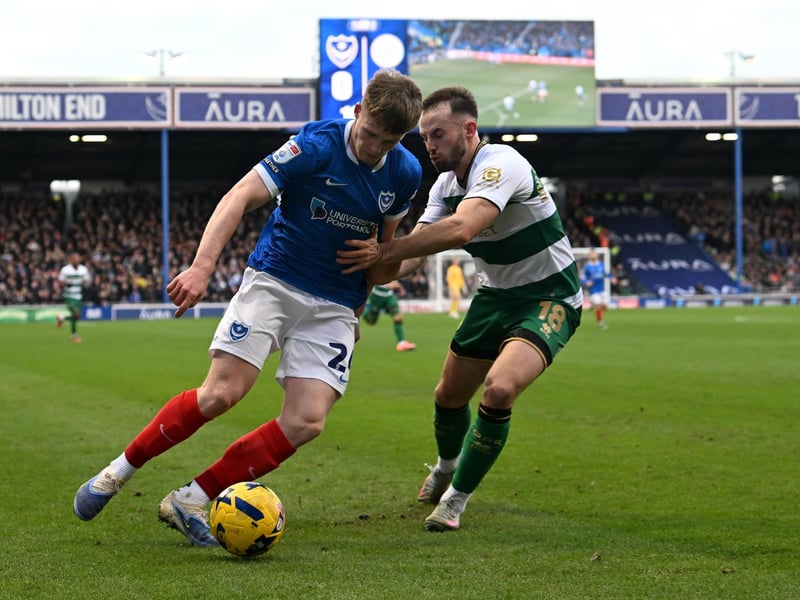Terry Devlin battles with QPR's Rhys Norrington-Davies in the first half against QPR. Picture: Graham Hunt/ProSportsImages