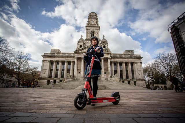 News reporter Fiona Callingham tries out one of the e-scooters at Portsmouth Guildhall Walk.

Picture: Habibur Rahman