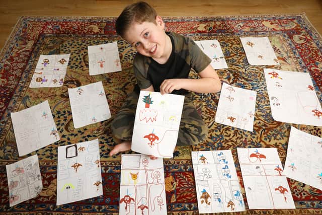 Leo is pictured at home in Hayling Island with some of his work. Picture: Chris Moorhouse (jpns 031221-34)