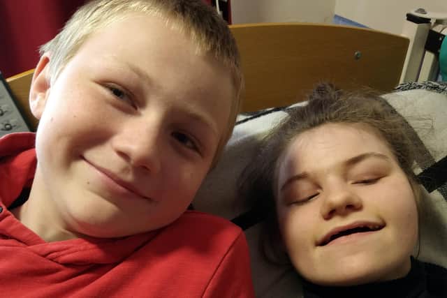 Eleanor Raleigh, 15, with her brother Lewis, 11, at home in FarehamTeenager Eleanor Raleigh, 15, has quadriplegic cerebral palsy and epilepsy due to a rare genetic condition, Incontinentia Pigmenti, and was blind until around two years ago when she inexplicably regained her sight to the astonishment of her family. This has led to her 11-year-old brother Lewis taking on a 24-hour silence fundraiser to make the £12,000 needed for equipment so his sister can communicate with them in a way that matches her cognitive ability.