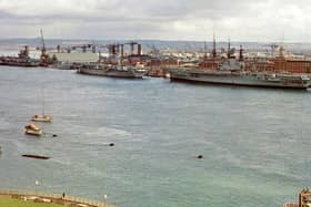 Three more carriers... HM Ships Hermes, Albion and Victorious alongside in Portsmouth Dockyard in the 1960s. Picture: Graham Stevens.