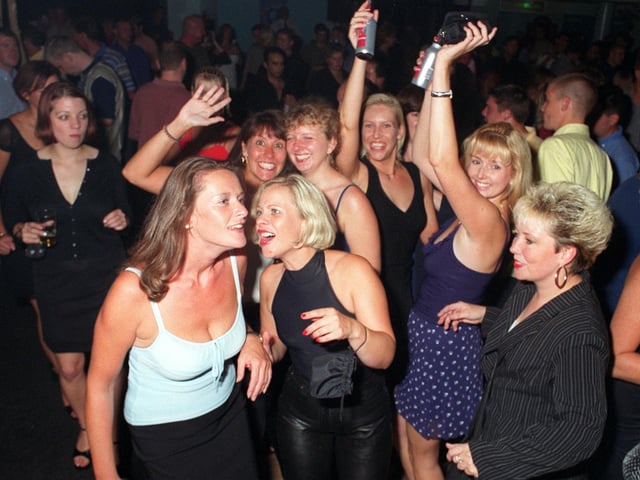 Revellers dancing the night away at Buddies 25+ nightclub at The Pyramids Centre, Southsea.