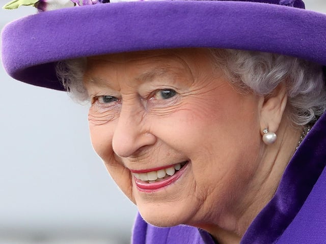 Queen Elizabeth II attends the Commissioning Ceremony of HMS Queen Elizabeth at HM Naval Base on December 7, 2017 in Portsmouth