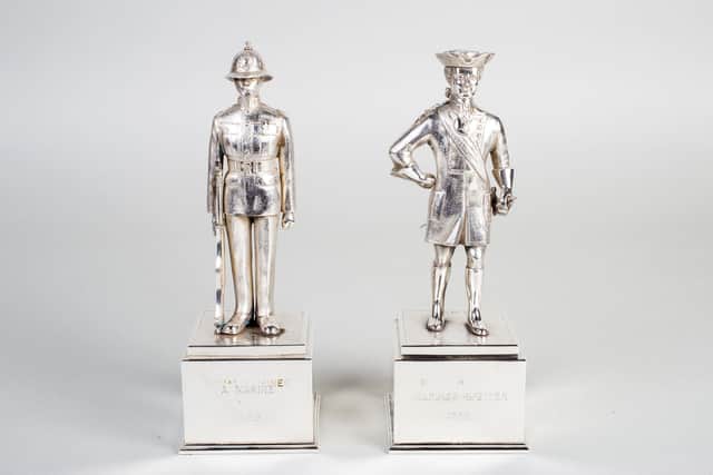 These two Royal Marine figures were presented to Portsmouth by the Duke of Edinburgh in 1959 when the Royal Marines were awarded the freedom of the city.