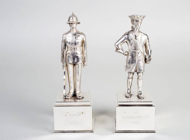 These two Royal Marine figures were presented to Portsmouth by the Duke of Edinburgh in 1959 when the Royal Marines were awarded the freedom of the city.