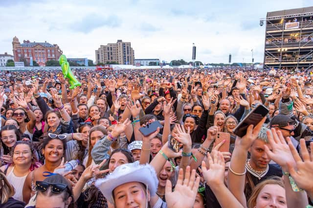 A sea of people in front of the Common StagePhotos at Alex Shute