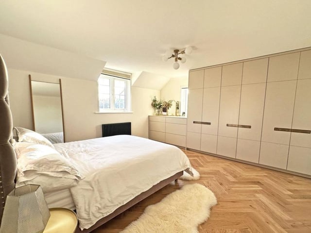 This property comes with six bedrooms, five bathrooms and two reception rooms as well as a swimming pool and a spacious garden.