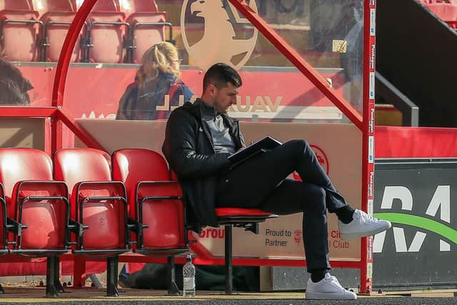 Pompey head coach John Mousinho deep in thought ahead of last Saturday's draw at Lincoln.