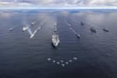 Front row: HMS Prince of Wales. Row 2 (L-R): USS Paul Ignatius, ESPS Almirante Juan de Borbon, Row 3 (L-R): HMS Portland, HNLMS Karel Doorman, HNOMS Magnus Lagabote, RFA Tidespring, HNOMS Olav Tyrggvason, ITS Giuseppe Garibaldi, FS Normandie. Row 4 (L-R): RFA Mounts Bay, HNOMS Otto Sverdrup, HNOMS Gnist, Kv Bjornoya, FGS Bonn