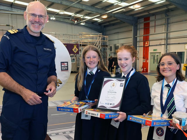 CNEO, RAdm McCarthy presents children from the Priory school with a silver award for their performance in activities at SULSTEMIC