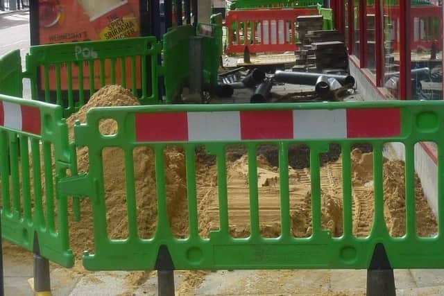 The continuing work on Commercial Road.