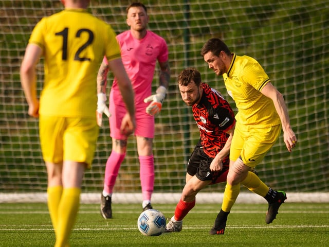 Action from Harvest's 4-1 win at home to Locks Heath (red and black kit) in the Hampshire Premier League. Picture: Keith Woodland (180321-1046)