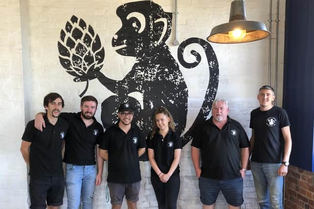 Andy Burdon, second right, CEO of Powder Monkey Brewery and his team.