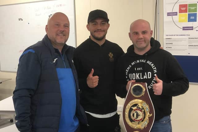 US Portsmouth manager Glenn Turnbull, left, Mikey McKinson, centre, and emergency response team medic and mental health first aider Danny Thompson