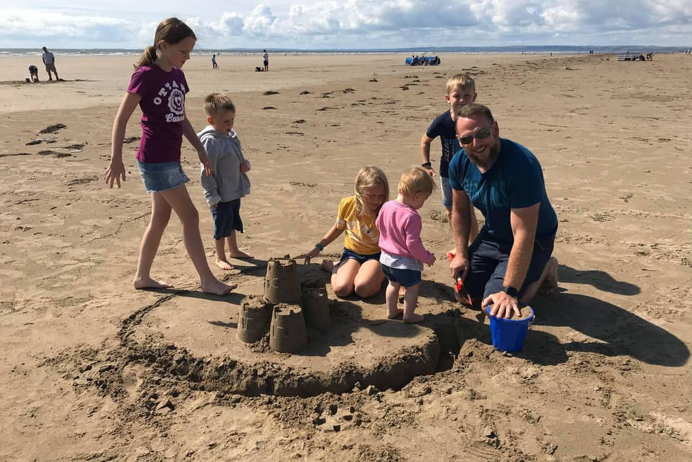 Royal Navy chief petty officer Keith Ross with his five children. CPO Ross died in a car crash on the M275 on July 15.