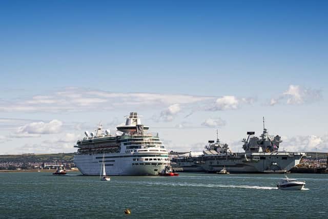 Majesty of the Seas sails past HMS Queen Elizabeth and HMS Prince of Wales.  Photo: Tom Langford